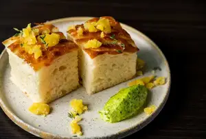 Homemade focaccia with herb butter