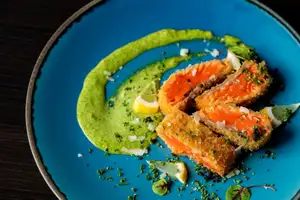 Rare salmon cutlet with basil mayonnaise sauce
