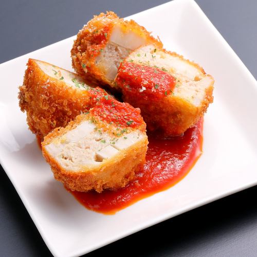 Fried lotus root meatballs with tomato sauce