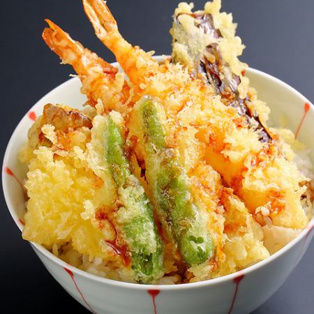 Bowl of rice and fried fish