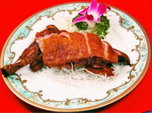 Deep-fried smoked duck marinated in sauce