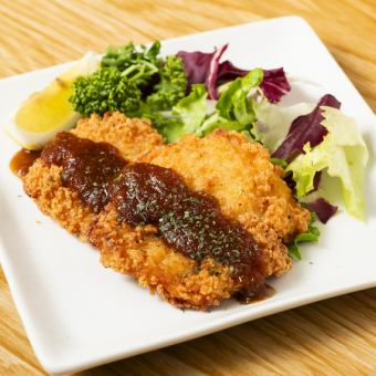 具だくさんゆずソースをかけた フライドチキン