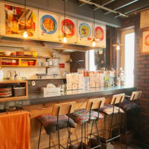 The counter seats are in an open kitchen, so you can enjoy watching the food being prepared while you dine.