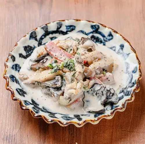 Sautéed three kinds of mushrooms in porcini sauce