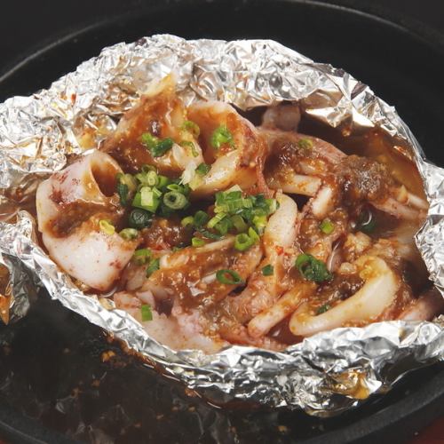 Grilled squid in foil