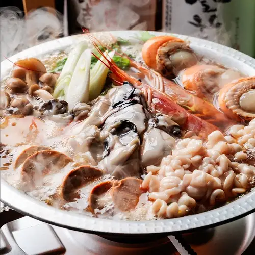 A luxurious gout-inducing hot pot featuring oysters, cod roe, and monkfish liver.