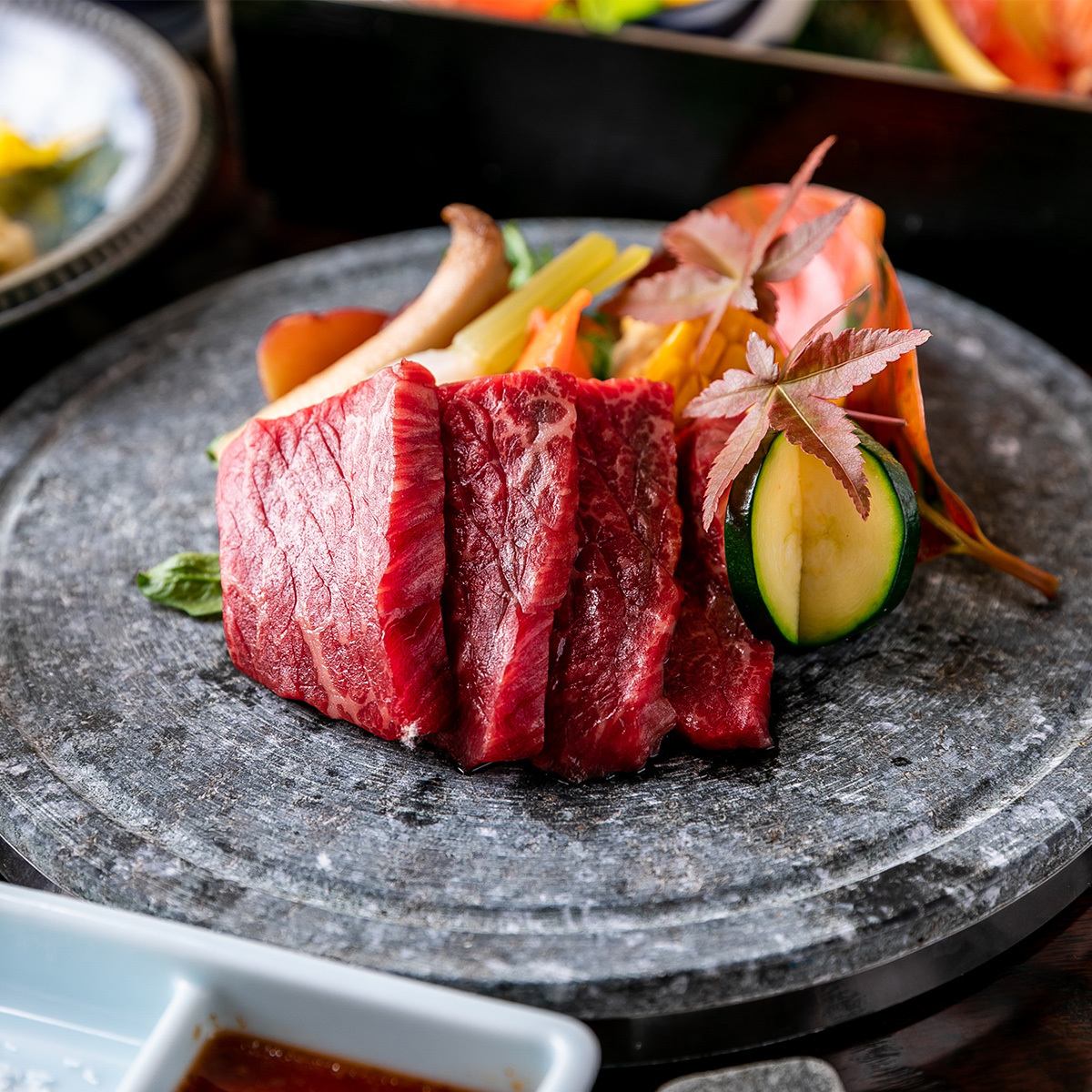 Enjoy dishes made with carefully selected ingredients such as Kuroge Wagyu beef!