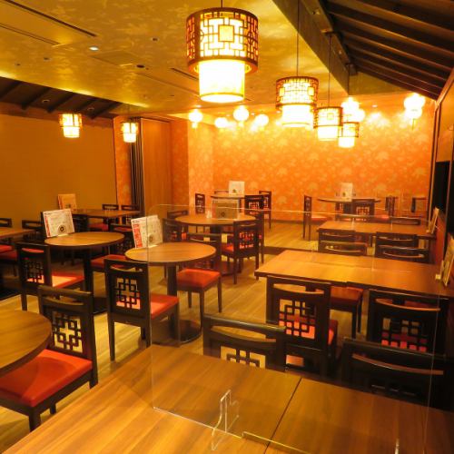 Enjoy delicious food in an open interior and lantern-filled atmosphere.