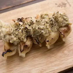 Grilled dumplings with pickled mustard greens and tartar sauce