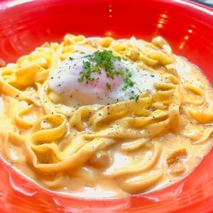 Snow crab in tomato cream sauce with soft-boiled egg