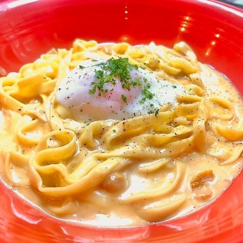 Snow crab in tomato cream sauce with soft-boiled egg