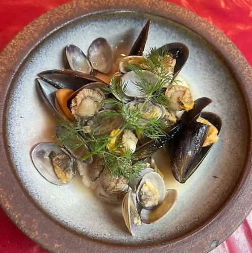 Steamed mussels and sea bream from Kada in white wine, served with mentaiko butter.