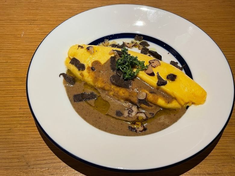 Luxurious truffle omelet with runny eggs