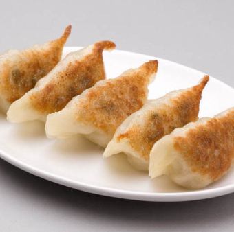 2 pieces of grilled dumplings with soup