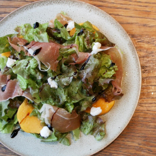 A gorgeous salad of seasonal fruits, prosciutto and ricotta