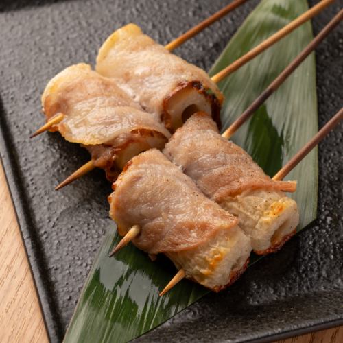 2 skewers of rolled chikuwa