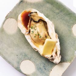 Shelled oysters grilled with butter and soy sauce