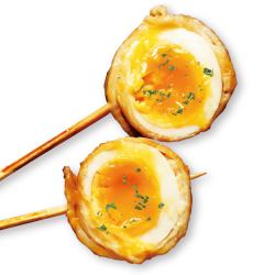 Soft-boiled egg roll with sauce