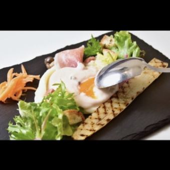 Oeufs coulant with black truffles and mornay sauce