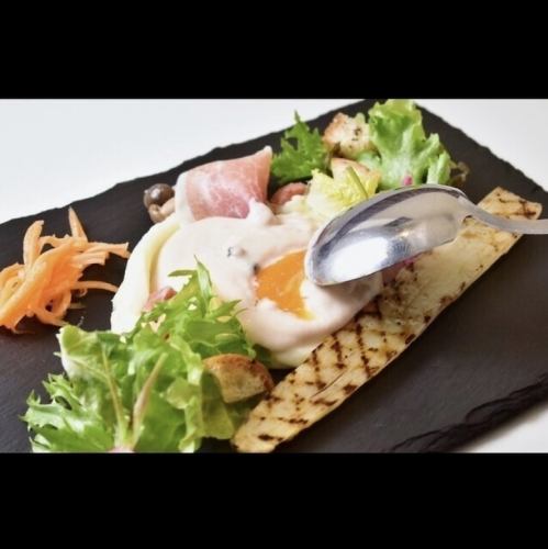Oeufs coulant with black truffles and mornay sauce