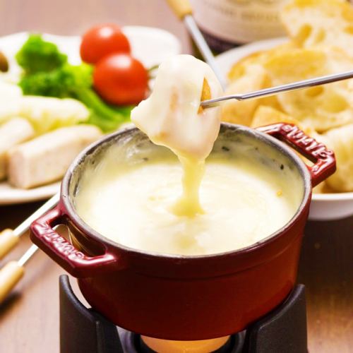 The main course is cheese fondue! All-you-can-eat with 50, 60, or 70 varieties!!