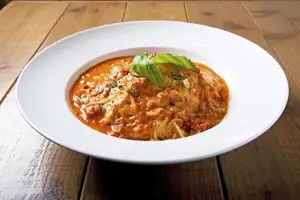 Mozzarella and mixed cheese in tomato sauce