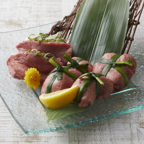 Assortment of green onion wrapped tongue and tied tongue