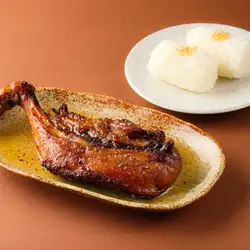 Iwate Prefecture's Iwai Chicken, grilled to perfection with its rich broth.