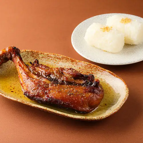 Iwate Prefecture's Iwai Chicken, grilled to perfection with its rich broth.
