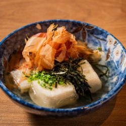 Deep-fried tofu and rice cake soup