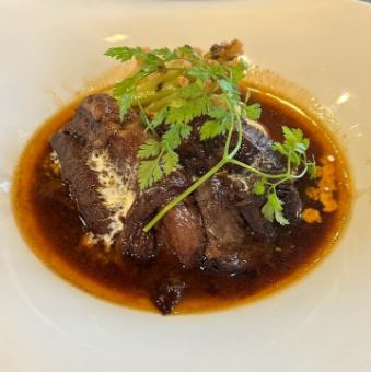 Iberian pork stewed in red wine