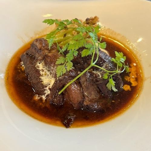 Iberian pork stewed in red wine