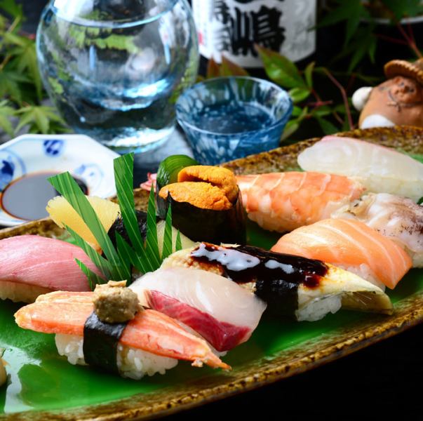 ``The chef's hand-made nigiri'' is made by many years of experience and a sharp eye.