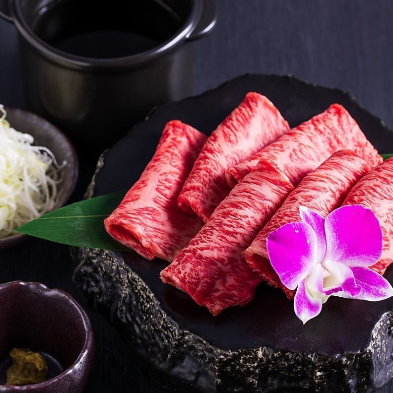 Grilled Wagyu beef shabu made with soba soup, yuzu pepper and crunchy green onions