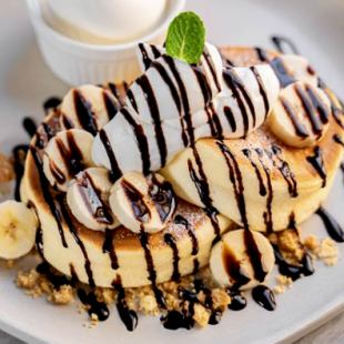 Chocolate banana pancakes with ice cream