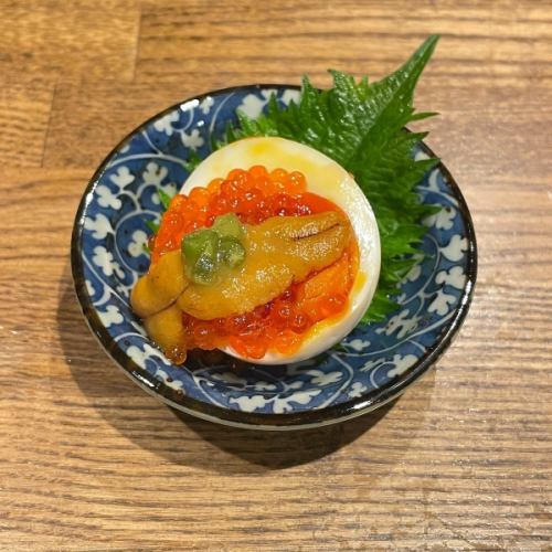 Soft-boiled egg topped with sea urchin salmon roe