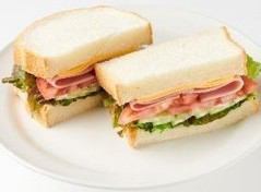 Ham and cheese sandwich with plenty of vegetables