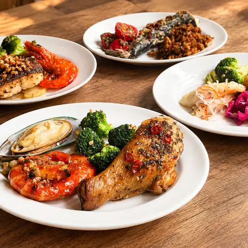 The selected dishes are plated on the spot.