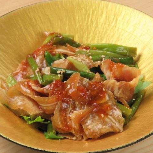 Smoked pig ears in thick ginger sauce