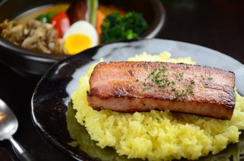 Thick-sliced grilled bacon on rice