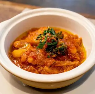Delicious tripe stewed in tomato sauce