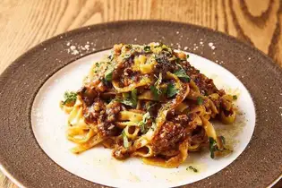 Rich Bolognese - A luxurious ragout simmered slowly.