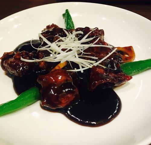 Three yuan pig's old meat (sweet and sour pork with black vinegar)