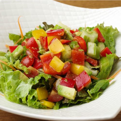 One bird chopped salad of seasonal vegetables