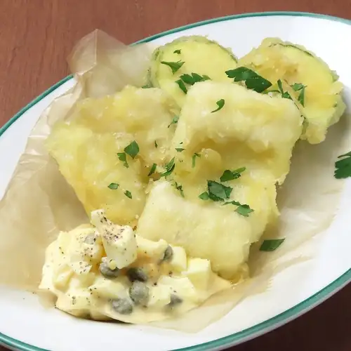 Enjoy a luxurious dish made with fresh, locally sourced seafood, perfect with a drink!