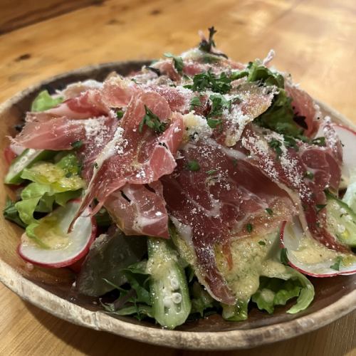 Salad with lots of raw ham