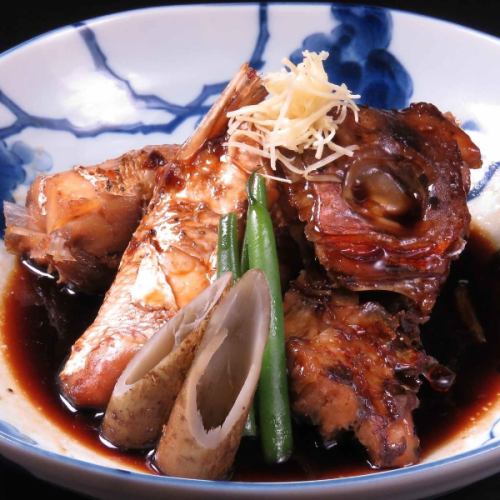 Grilled sea bream head with salt/cooked head