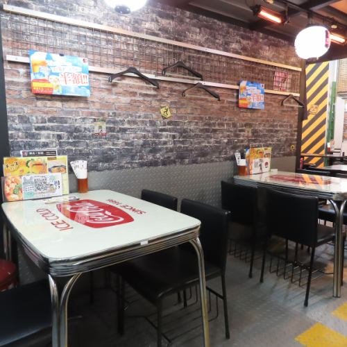 Stylish table seats with the logo.