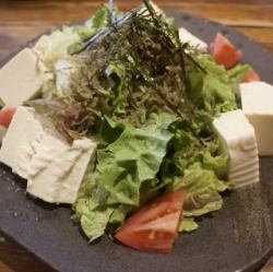 Korean-style spicy salad with chunky bacon / crispy small sardines and tofu salad