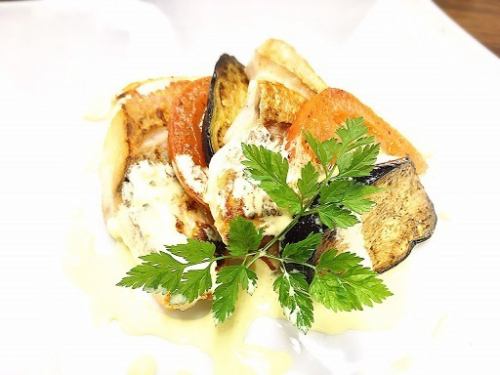 White fish and tomato mille-feuille with vermouth wine sauce